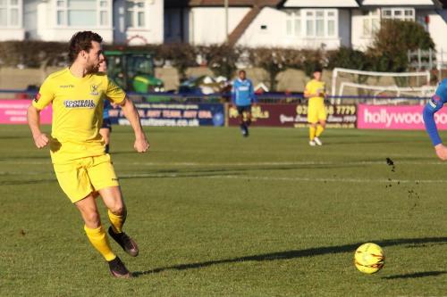 Harry Ottaway squares the ball for Karl Oliyide to score the third Enfield goal