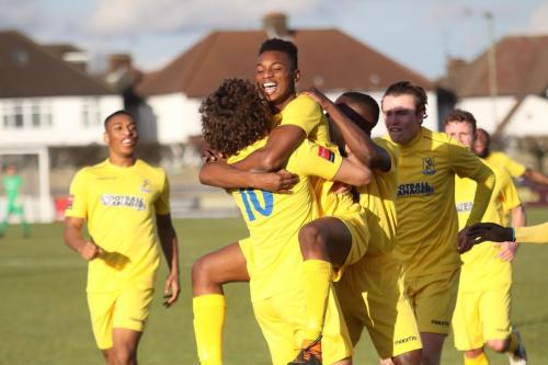 Karl Oliyide leads the celebrations for the second Enfield goal, scored by Harry Ottaway (10)