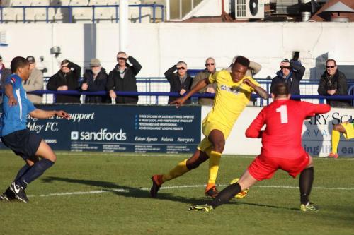Karl Oliyide takes the ball past Wingate keeper Shane Gore but is forced too wide