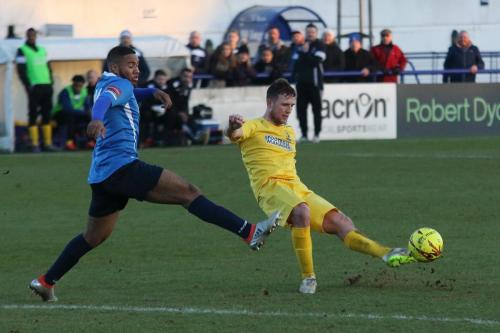Wingates Luke Ifikl (L) and Enfields Billy Crook