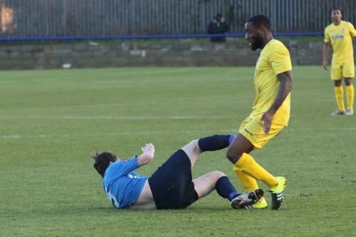 Wingates Sean Cronin (L) and Enfields Harold Joseph