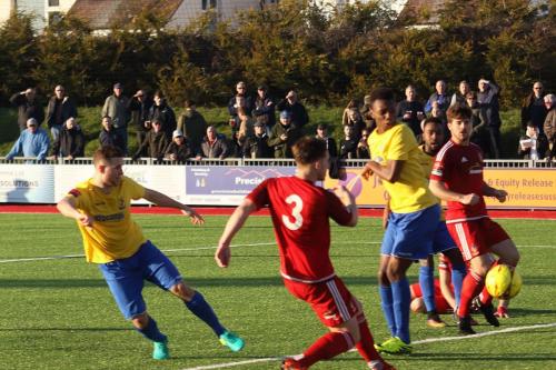 Billy Crook (L) puts Enfield 2-0 up