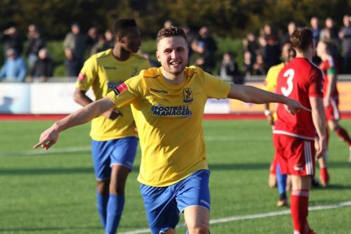 Billy Crook celebrates the second Enfield goal