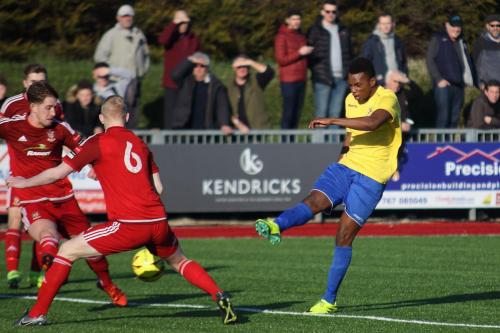 Enfields Karl Oliyide shoots from the edge of the box