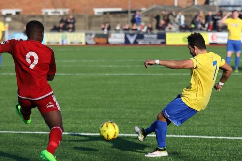 Enfields Tyler Campbell crosses as David Ajiboye tries to block