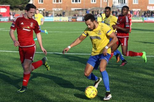 Enfields Tyler Campbell runs at Matt Boiling