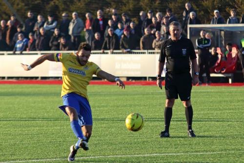 Enfields Tyler Campbell shoots over the bar