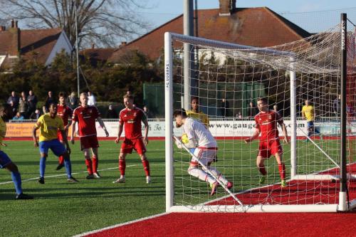 Worthing keeper Kieron Thorp saves from Mark Kirbys header