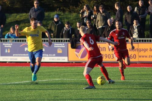 Worthings Corey Heath (6) cuts out Billy Crooks attempted through ball
