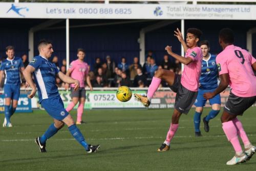 Enfields Montell Moore and Ryan Blake (9) and Billericays Danny Waldren