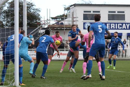 Enfields Taylor McKenzie (pink, L) opens the scoring