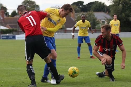 Brightlingseas Aaron Condon (11) and Jake Gould and Enfields Mickey Parcell