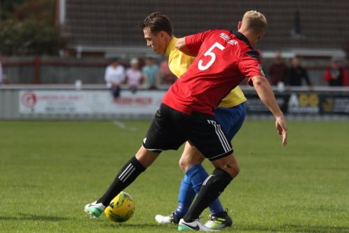 Brightlingseas Josh Gould (red) and Enfields Mickey Parcell