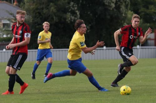 Brightlingseas Matt Cripps (L) and Connor Witherspoon and Enfields Sam Youngs