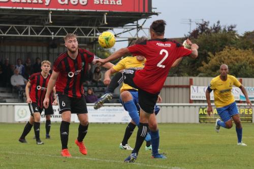 Brightlingseas Ricky Griggs (2) clears