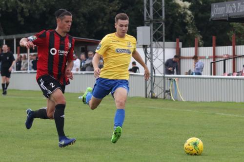 Brightlingseas Ricky Griggs (L) and Enfields Ben Ward-Cochrane