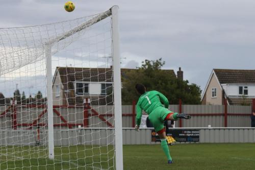 Brightlingseas Sam Cowler tips Sam Youngss shot round the post