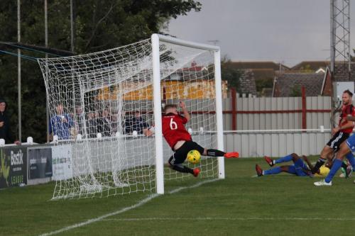 Brigthtlingseas Matt Cripps blocks Ryan Blakes shot on the goal line