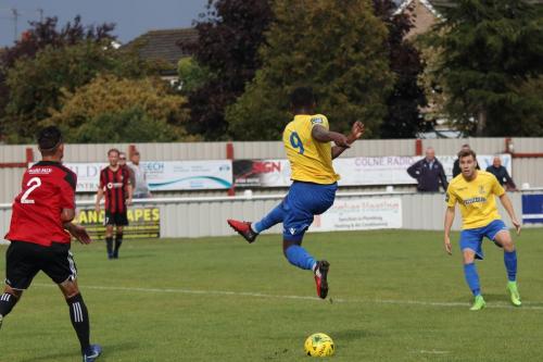 Enfields Ryan Blake plays an air shot