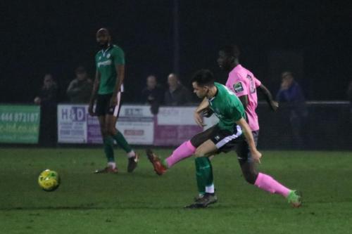 Enfields Junior Mubiayi (pink) challenges Conor Tighe