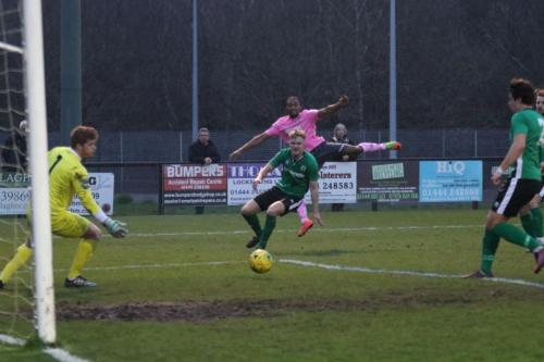 Immediately after scoring the opening goal, Enfields Dernell Wynter shoots just wide of the far post