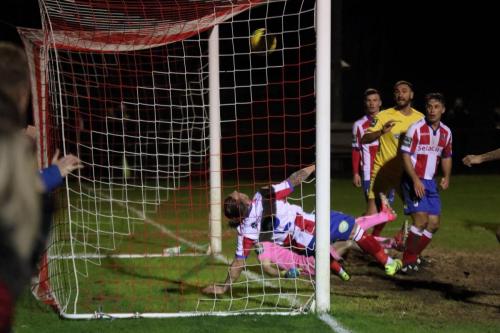 Dorkings Jerry OSullivan cant stop Junior Mubiayis shot making it 2-2