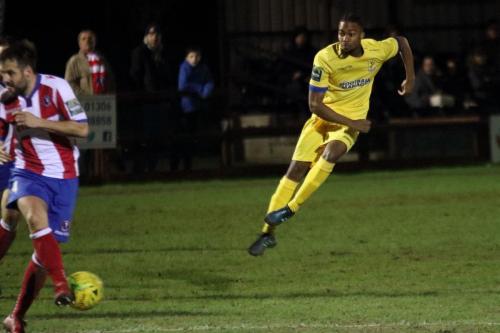 Enfields Dernell Wynter shoots but Dean Hamlin blocks