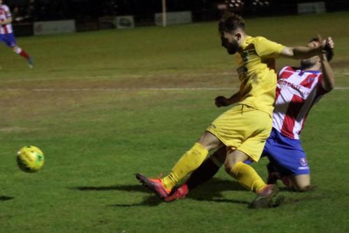 Enfields Jack Hockney (yellow) and Dorkings Dean Hamlin