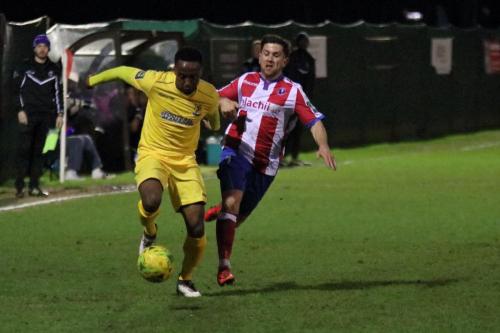 Enfields Ryan Blake (L) and Dorkings Anthony Oakes