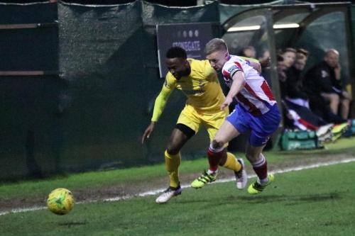 Enfields Ryan Blake (L) and Dorkings Chris Boulter