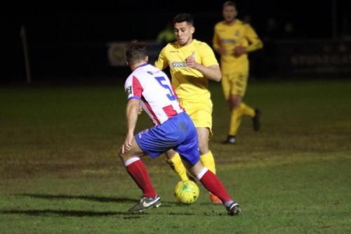 Enfields Samir Bihmoutine (yellow) runs at David Ray