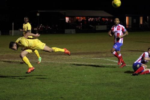 Enfields Samir Bihmoutine (yellow, front) and Junior Mubiayi and Dorkings Jerome Beckles and Dean Tamlin (R)