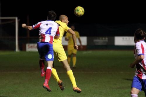 Enfields Simon Thomas (yellow) and Dorkings Dean Hamlin