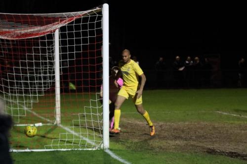 Enfields Simon Thomas celebrates after Dorking keeper fumbles a harmless cross into his own goal - Thomas was nowhere near at the time