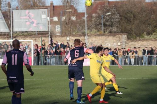 Dulwichs Mark Weatherstone (6) heads clear from Tyler Campbell