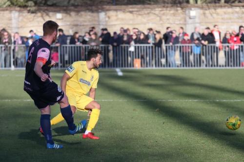 Dulwichs Mark Weatherstone (L) clears from Tyler Campbell