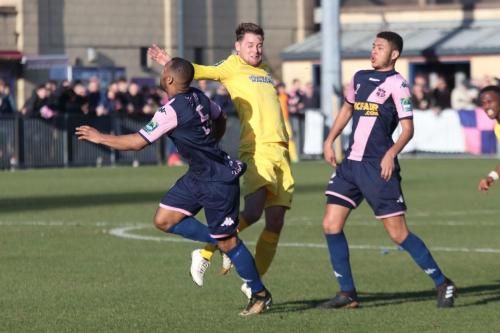 Dulwichs Rickie Hayles (L) and Quade Taylor and Enfields Liam Hope