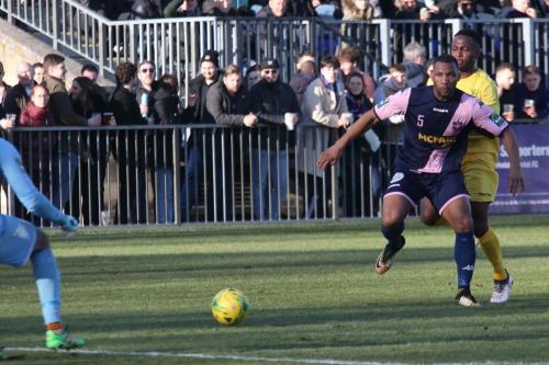 Dulwichs Rickie Hayles holds off Ryan Blake and allows the ball to run to keeper Preston Edwards