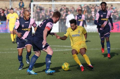 Dulwichs Sanchez Mings (L), Mark Weatherstone and Nathan Ferguson (R) and Enfields Tyler Campbell