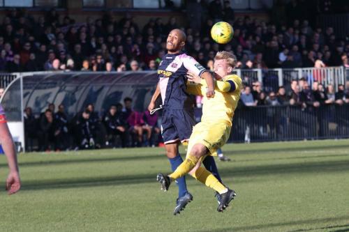 Dulwichs Sanchez Mings (L) and Enfields Ryan Blackman