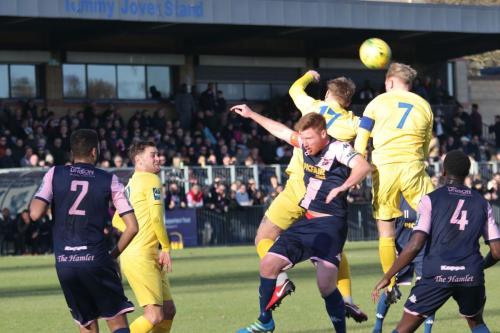 Enfields Dan Rumens (17) and Ryan Blackman (7) outjump Mark Weatherstone