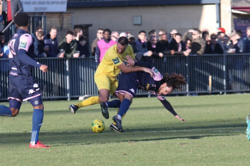 Enfields Mat Mitchel-King (yellow) challenges Reise Allassani