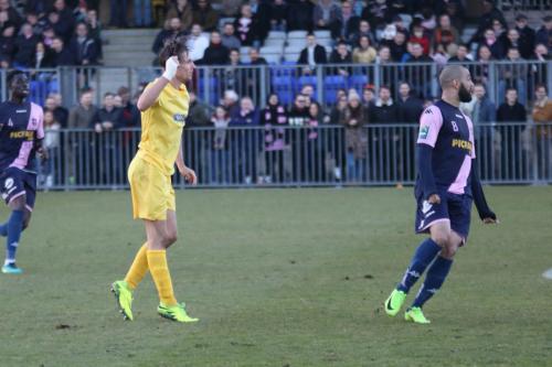 Enfields Sam Youngs (L) watches as his long-range effort makes it 1-1