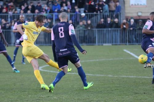 Enfields Sam Youngs sees his shot blocked by Rickie Hayles