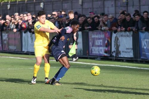 Enfields Samir Bihmoutine (L) and Dulwichs Nyren Clunis