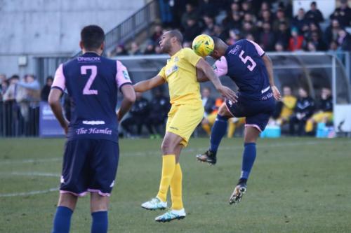 Enfields Simon Thomas and Dulwichs Rickie Hayles (R) and Quade Taylor