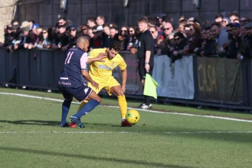 Enfields Tyler Campbell (R) and Dulwichs Sanchez Mings