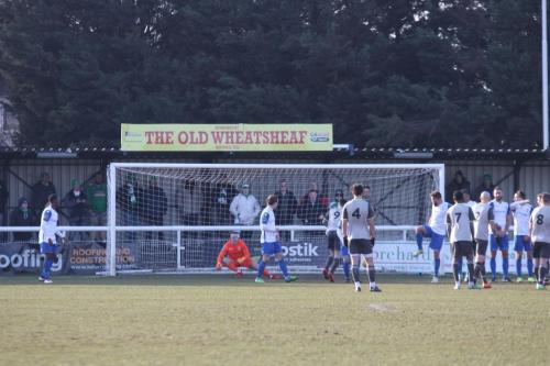 A deflected free kick gives Leatherhead the only goal of the game