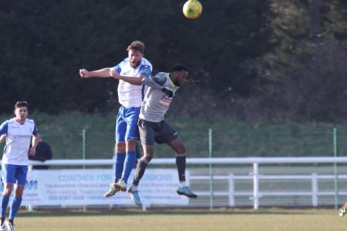 Enfields Adam Martin (L) challenegs DSean Theobalds