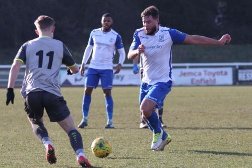 Enfields Adam Martin (R) and Leatherheads Nathan Wood